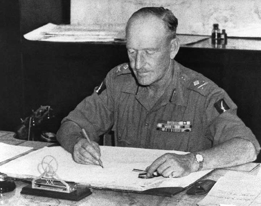 Major Gen. Douglas H. Gracey, chief of the Allied Control Commission in French Indochina, at his desk on Dec. 3, 1945. (AP Photo)